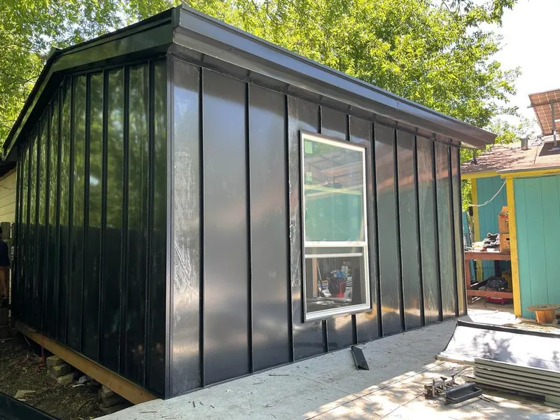 Black standing seam metal wall panels for Roof Inspection in Park Ridge