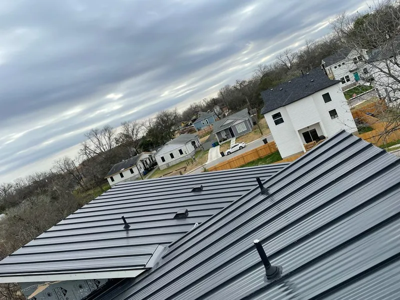 Standing seam metal roof panels with vents for Skylight Repair in Park Ridge